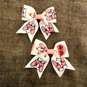 Frenchie pups in sunglasses pigtail bows